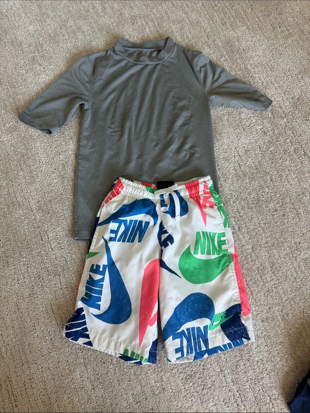 Nike White Swim Shorts with Blue, Green and Pink Logo Print
